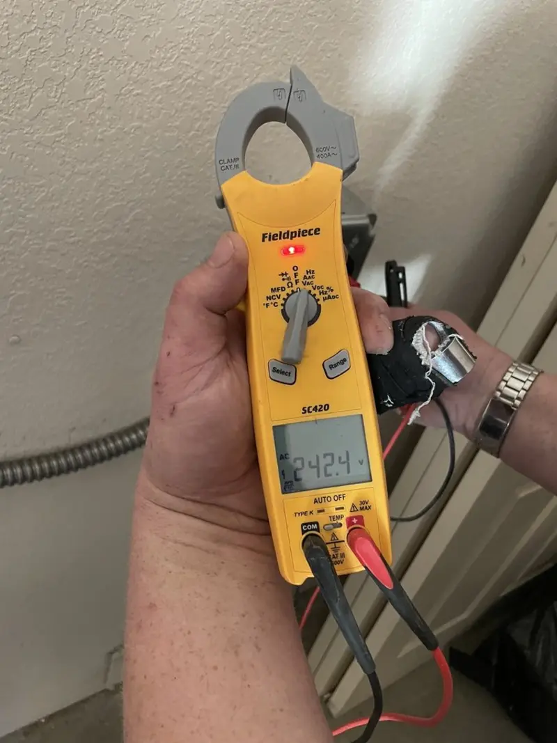 Voltage testing with clamp meter during Circuit Breaker Repair in Houma